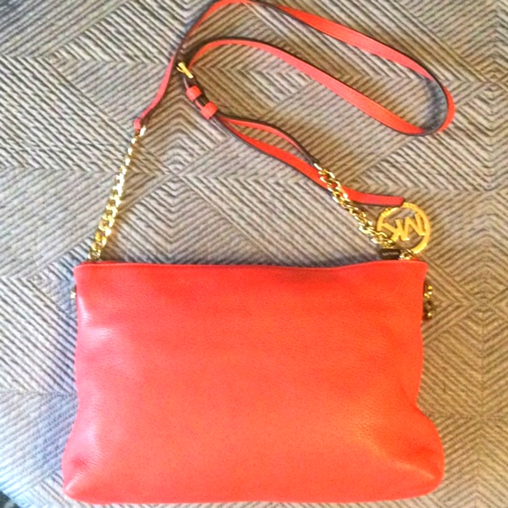 Michael Kors pink (coral) soft pebble leather crossbody bag for women